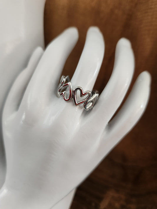 Silver hearts ring