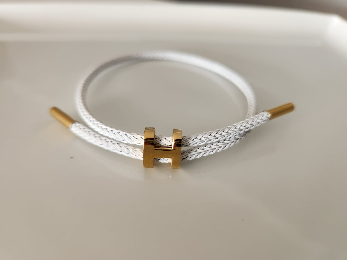 H White Cord Adjustable Bracelet